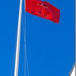 Close up of Southwold Sailors' Reading Room flag on flagpole